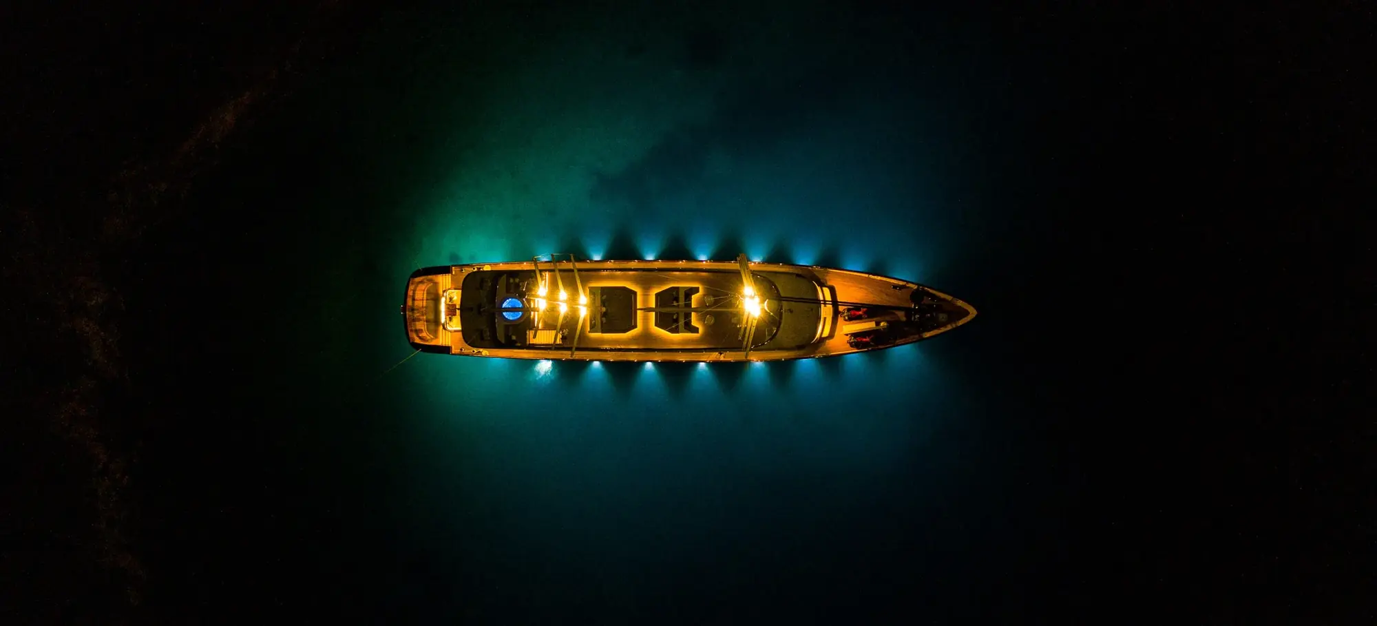 Tramontana yacht lit at night, seen from above